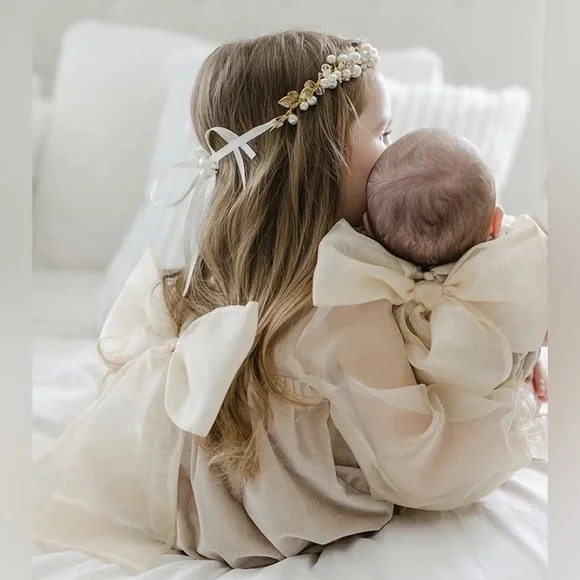 It’s not from Petit Maison Kids, romper 12-18 months.
